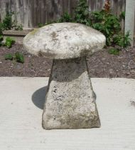 A stone staddle stone, 64cms high.