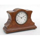 An Edwardian inlaid mahogany mantle clock, the white dial with Roman numerals, 24cms wide.