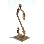 A gilt metal table lamp with acanthus leaf decoration, 45cms high.