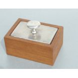 A George V silver lidded oak trinket box, the rectangular silver top with engine turned decoration
