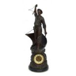 A late 19th / early 20th century bronzed and patinated figural mantle clock in the form of a