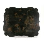 A 19th century chinoiserie lacquer panel decorated with figures in a landscape on a black ground,