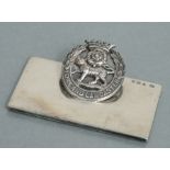 A Goldsmiths and Silversmiths regimental silver menu holder for the York & Lancaster Regiment,