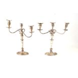 A pair of silver plated Adams style three-branch candelabra, 43cms high.Condition ReportOne