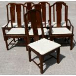 A set of eight Chinese hardwood dining chairs, six chairs and two carvers; together with a pair of