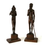 A pair of Australian carved wooden Aboriginal figures, signed 'Frentz', 35cms high (2).