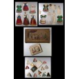 A quantity of Victorian paper doll's Russian costumes and a smaller paper doll set in original