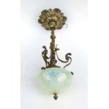 A WAS Benson style brass ceiling light with Vaseline type glass shade, 55cms high.