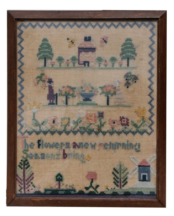 A 20th century needlework sampler, decorated figures, flowers and verse. framed and glazed. 32 by