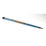 A vintage novelty walking stick / snooker cue decorated with a peacock, 86cms long.