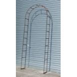 A weathered metal garden arch, 101cm wideCondition Reportsolid metal construction not hollow tubing