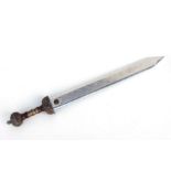A Roman Centurion style sword with engraved blade, 78cms long.