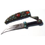 A Turkish ceremonial dagger, the scabbard decorated with turquoise and hardstone cabochons, 31cms