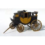 A scratch built painted wooden model of a carriage 'Falcon Poole', 34cms long.