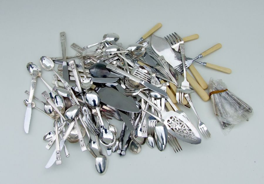 A quantity of assorted silver flatware to include fish knives and forks.