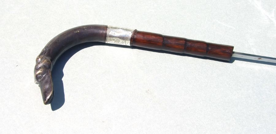 A partridge wood sword stick with bronze greyhound head handle and white metal collar, and square - Image 2 of 5