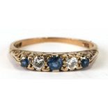 A 9ct gold diamond and sapphire ring, approx UK size 'N', 2.2g.