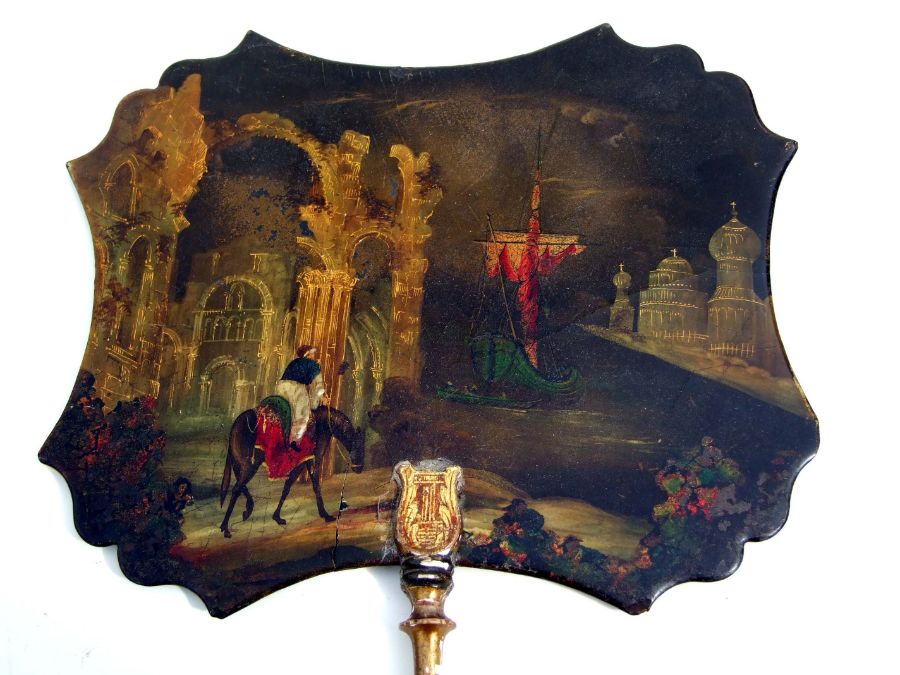 A Victorian papier-mache face shield decorated with a gentleman on horseback in a romantic - Image 2 of 6
