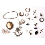 A quantity of silver and white metal jewellery to include brooches, rings and earrings.