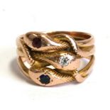 A yellow metal triple snake ring set with diamond, sapphire and ruby. approx. UK size I 5.