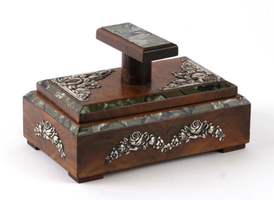 A Portuguese white metal mounted olive wood desk-top blotter box, 16cms wide.