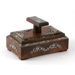 A Portuguese white metal mounted olive wood desk-top blotter box, 16cms wide.