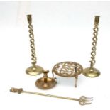 A pair of 19th century brass open spiral twist candlesticks, 40cms high; together with a