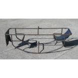 A vintage tubular steel see-saw, 126cms wide.