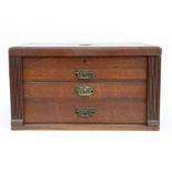 A late 19th century oak cutlery canteen with three long drawers, 51cms wide; together with a small