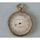 A Negretti & Zambra compensated pocket barometer, numbered '27377', 5cms diameter.