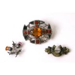 Two Scottish silver brooches; together with an Irish Connemara marble silver brooch (3).