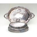 An Old Sheffield plate two-handled tray, 68cms wide; together with a silver plated meat dome