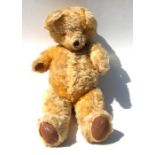 A vintage plush teddy bear, approx 58cms high.