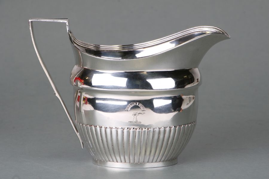 A George III Scottish silver cream jug with reeded decoration, makers McHattie & Fenwick,