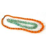 A string of amber type graduated bead necklace and another hardstone graduated bead necklace, (2)