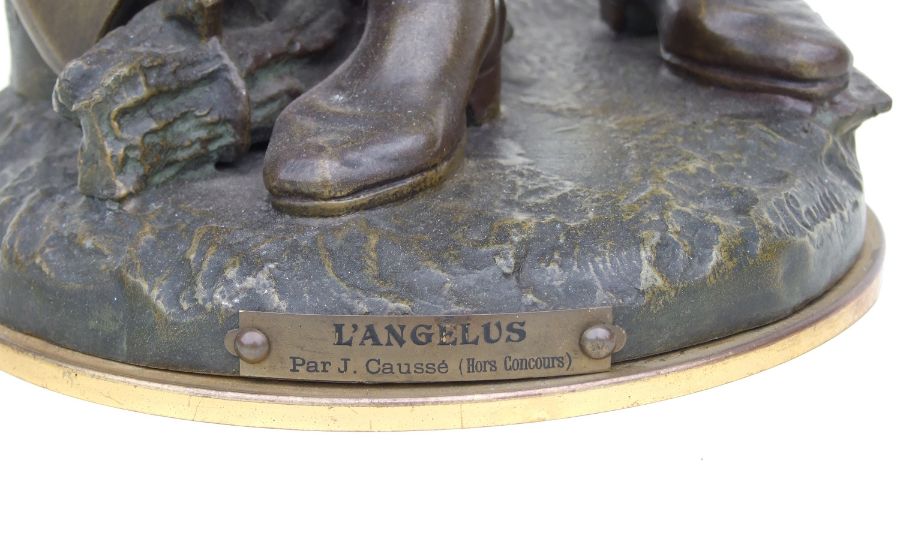 A large late 19th century bronzed spelter figure of a woodsman holding a hat and standing next to - Image 2 of 2