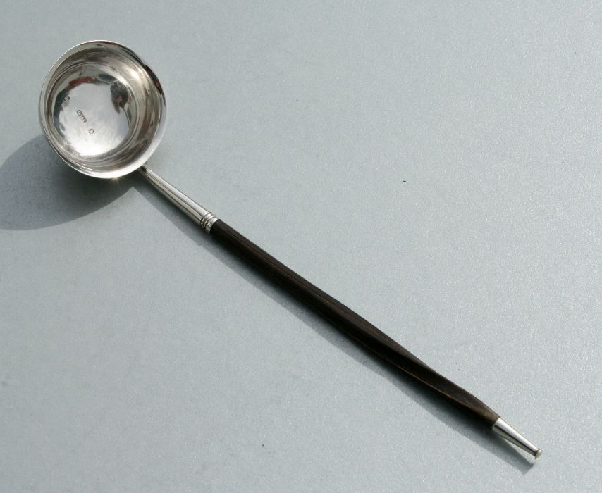 A George IV Scottish silver toddy ladle, the circular bowl with flared rim and turned whale bone