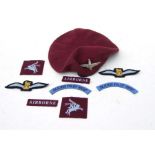 A reproduction Parachute Regiment insignia and beret.