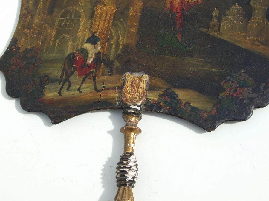 A Victorian papier-mache face shield decorated with a gentleman on horseback in a romantic - Image 5 of 6