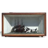 A cased diorama depicting three masted sailing ship at full sail, overall 89cm wide