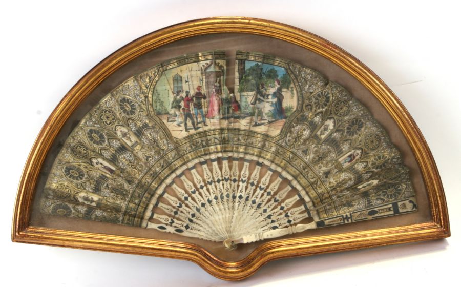 An 18th/Early 19th century Brise fan, painted with figures within a panel, mounted in a box frame,