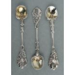 Three George III Scottish silver gilt salt spoons, the handles of sinuous form with acanthus leaf