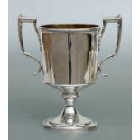 A George III Scottish silver twin-handled cup of plain form on spreading foot, the reeded angular
