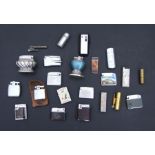A quantity of lighters to include Ronson, Zippo and trench art examples.
