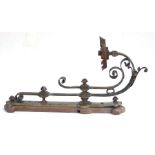 A gothic style steel wall light. 69cm high