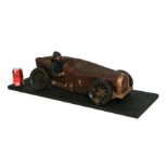 Contemporary: A Bugatti inspired large scale crash scene model mounted on a plinth, 92cms wide.