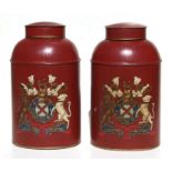 A pair of Victorian style painted metal tea canisters decorated with armorials, approx 44cms high (