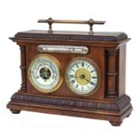 A stained walnut desk top clock barometer thermometer barometer, 28cms wide.