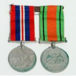 A mounted WWII Defence & War Medal pair together with various WWII period Civil Defence leaflets and