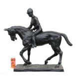 A large and impressive bronze study of a horse and jockey on a plinth base, approx. 96cms wide.
